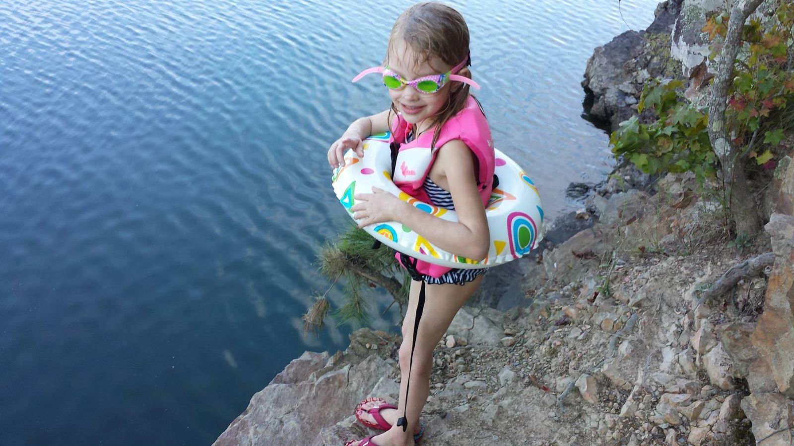 Child enjoying the shoreline at Lake DeGray