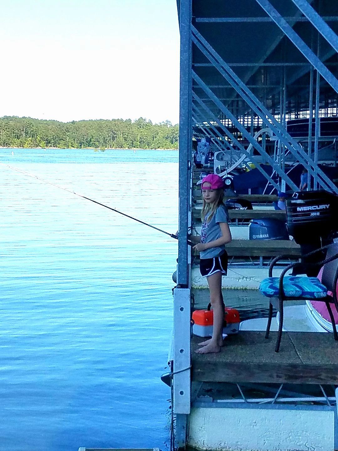 Fishing from the houseboat swim platform