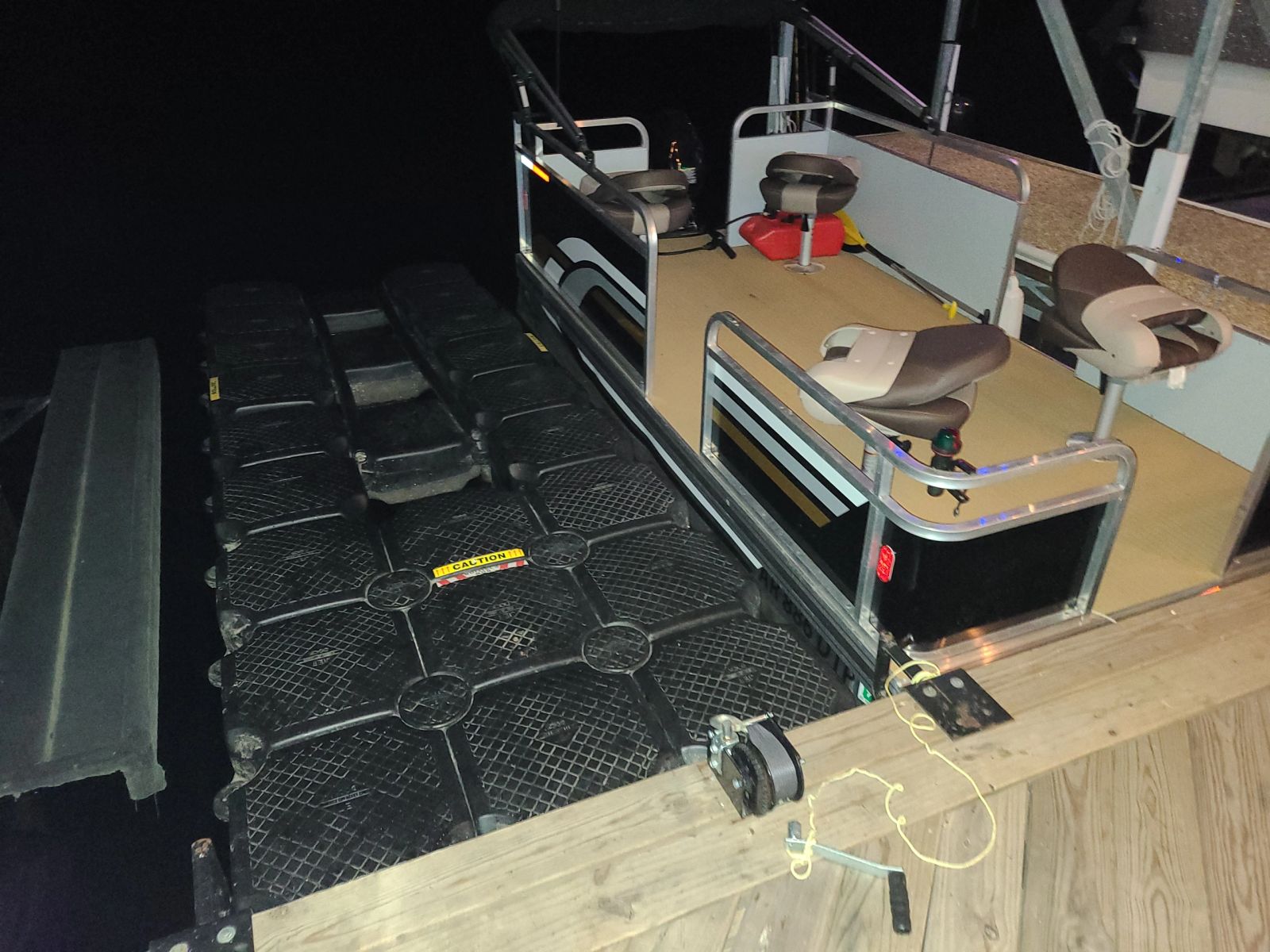 Watercraft lift and storage platform beside S Dock