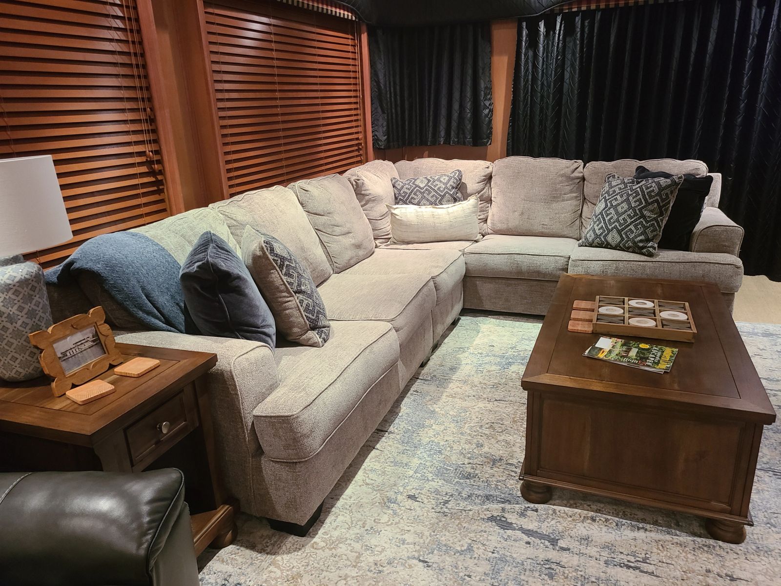 Furnished main salon with wood floors and lake views