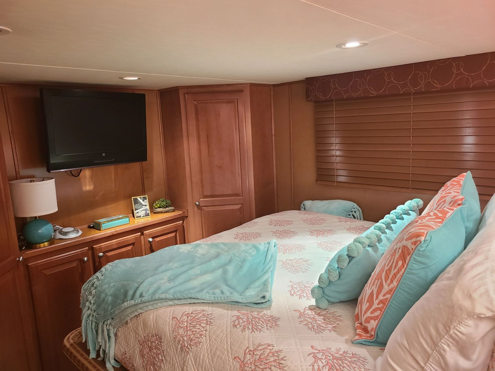 Bedroom storage cabinetry and lake-house finishes