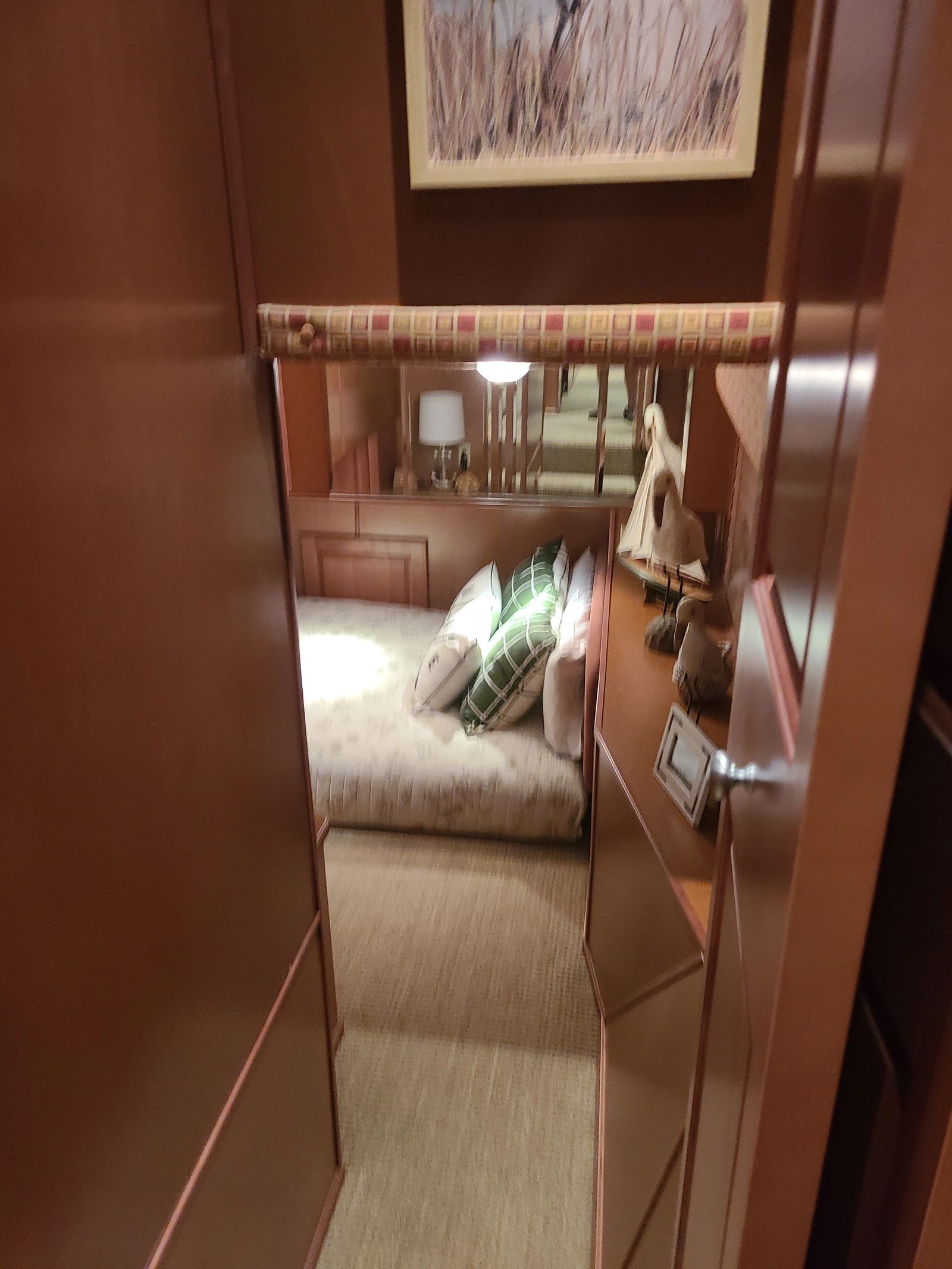 Private guest bedroom entry and built-in storage