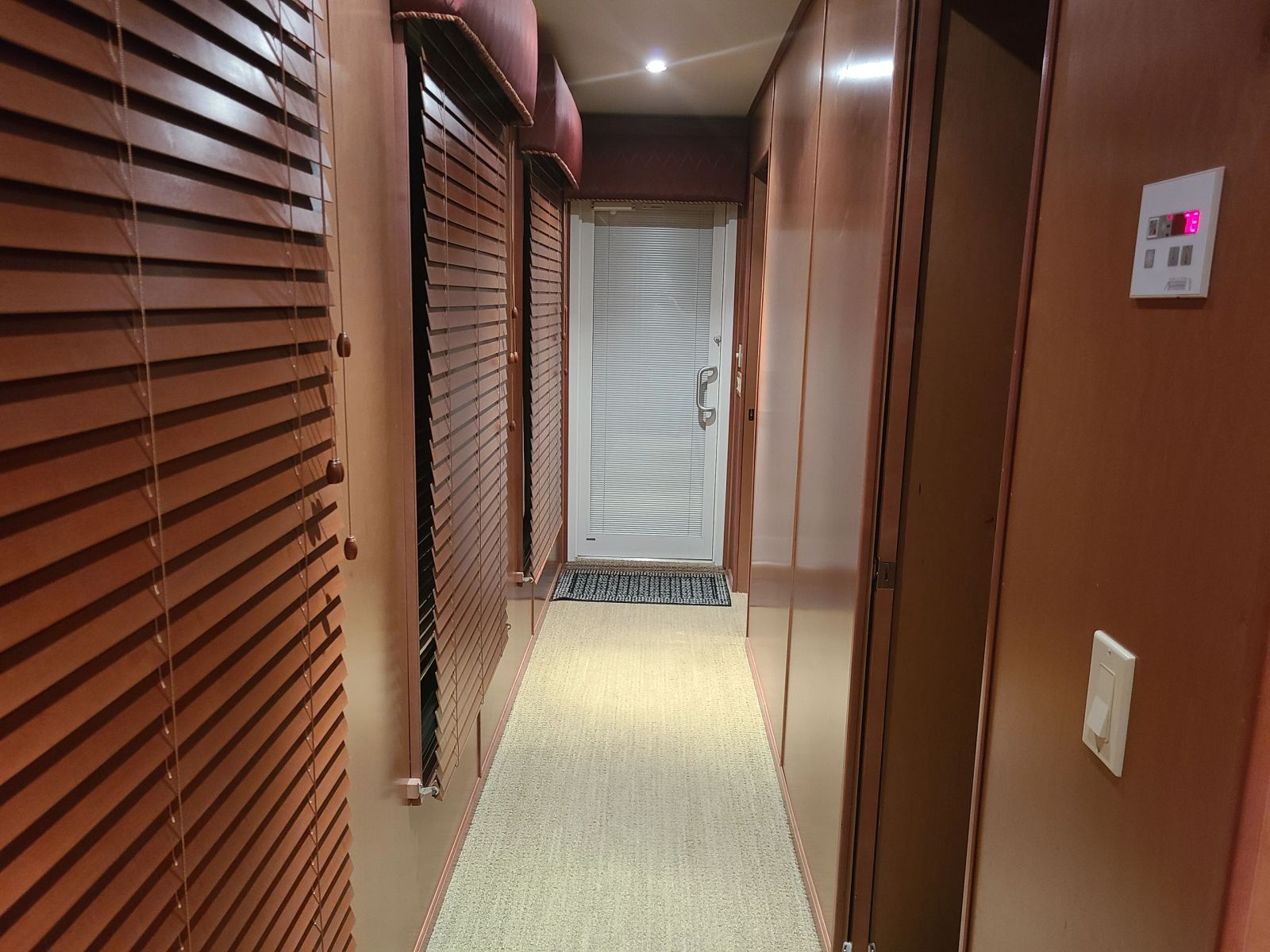 Interior hallway connecting the private bedrooms
