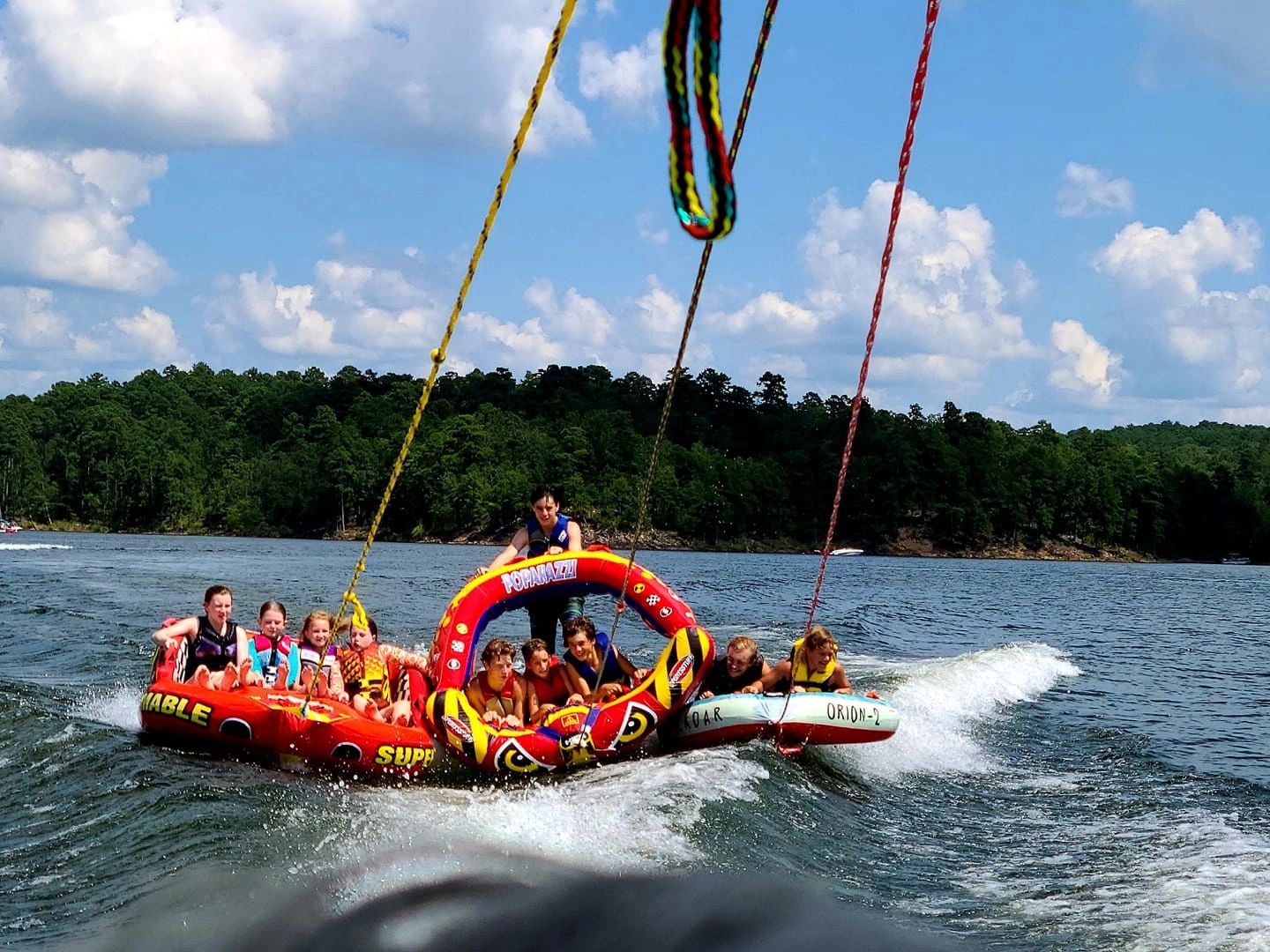 Family tubing during a Lake DeGray weekend