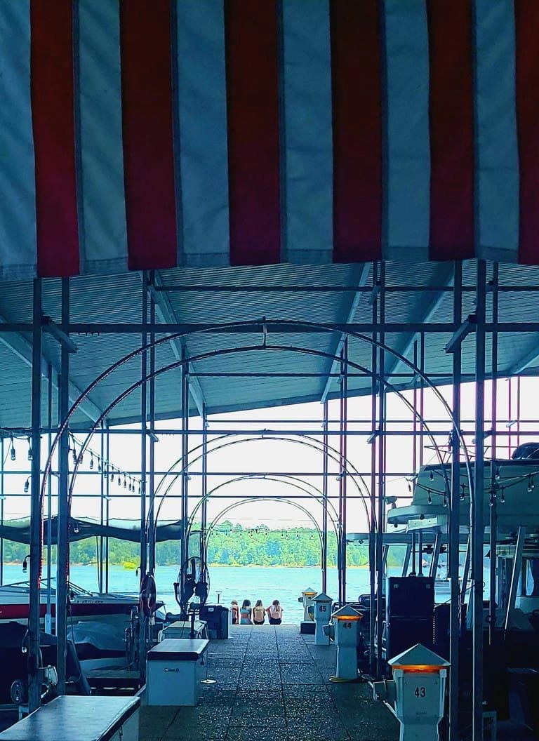 Covered S Dock structure at Iron Mountain Marina